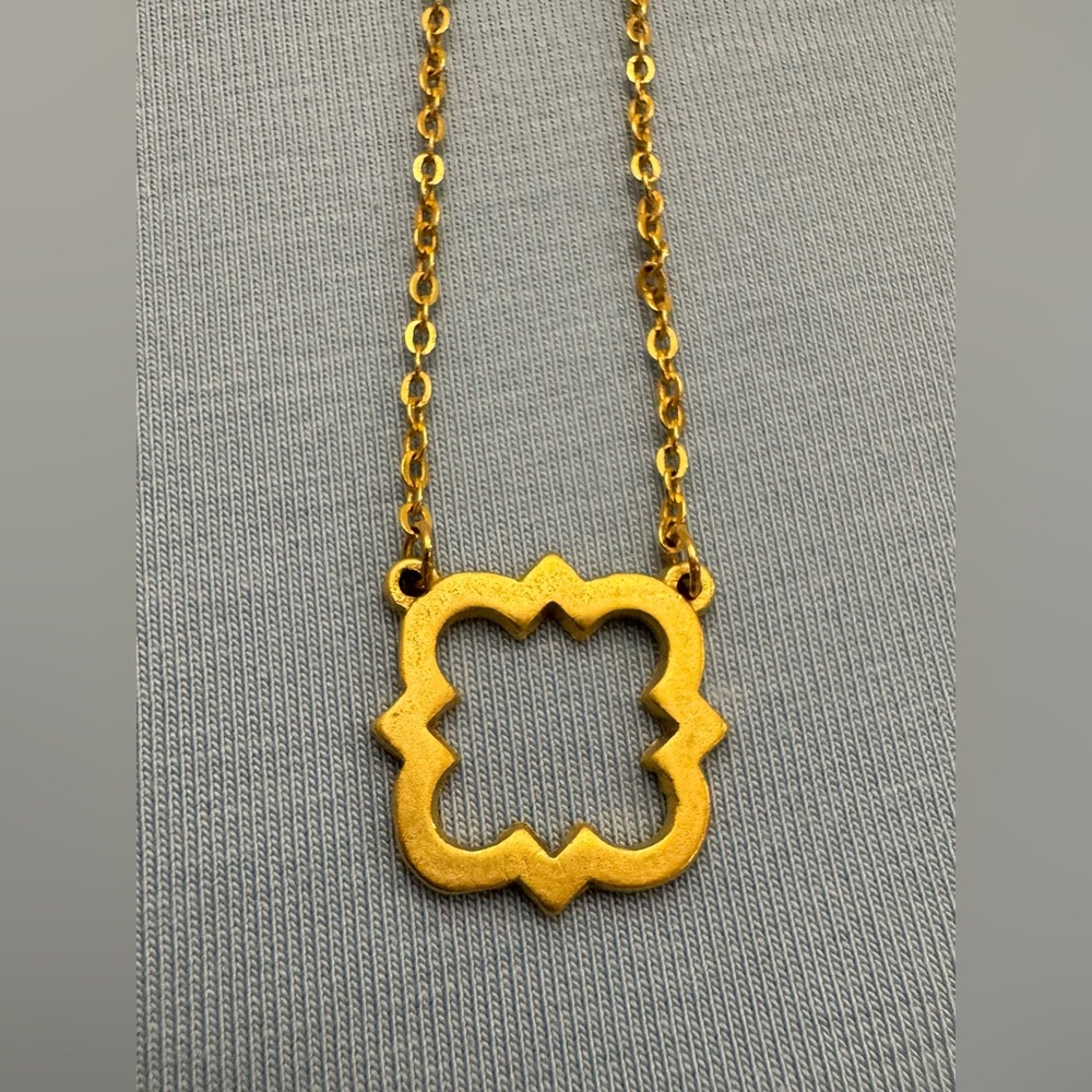 Quatrefoil Gold Tone Pendant Necklace